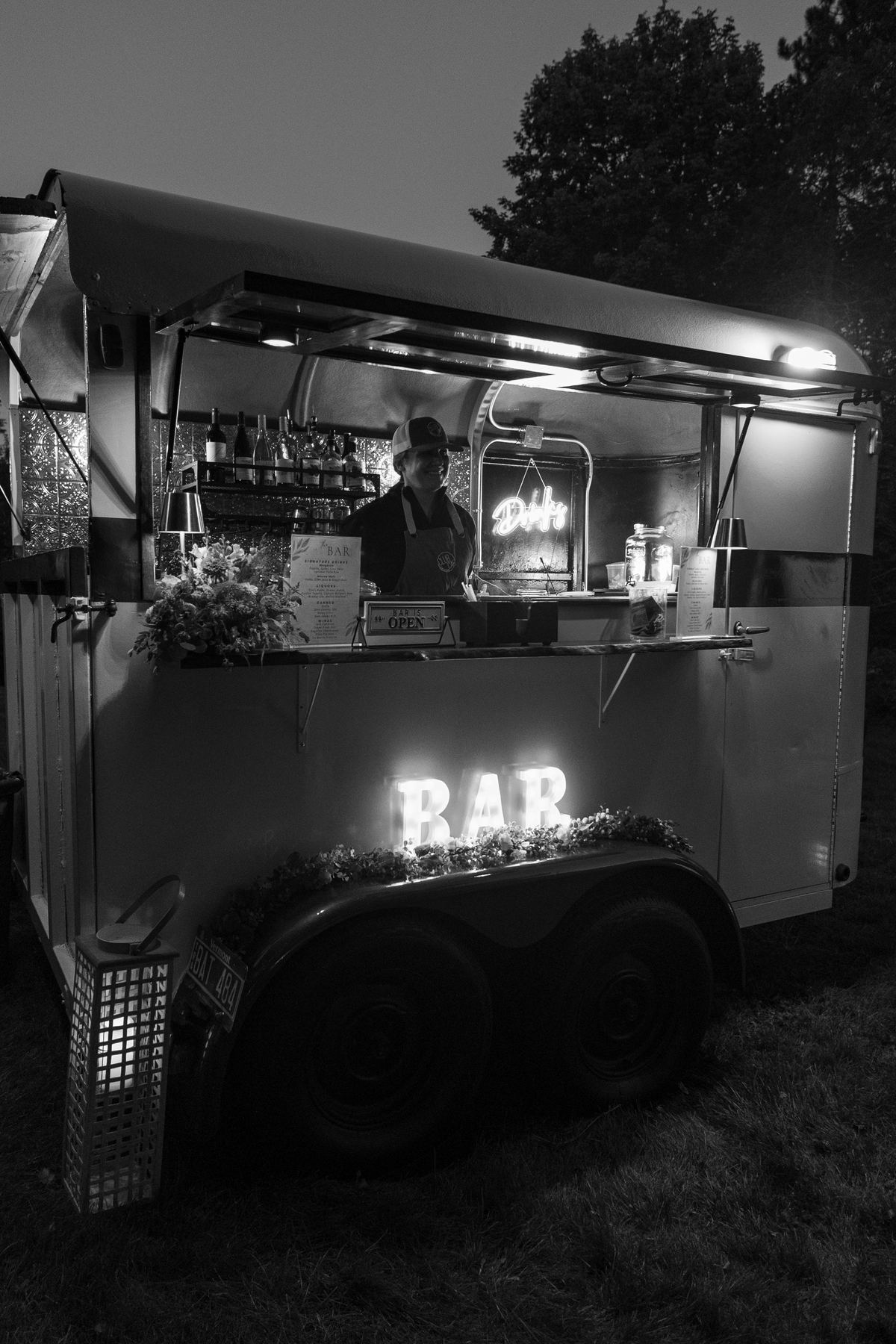 The Parlor Car mobile bar at dusk, black and white